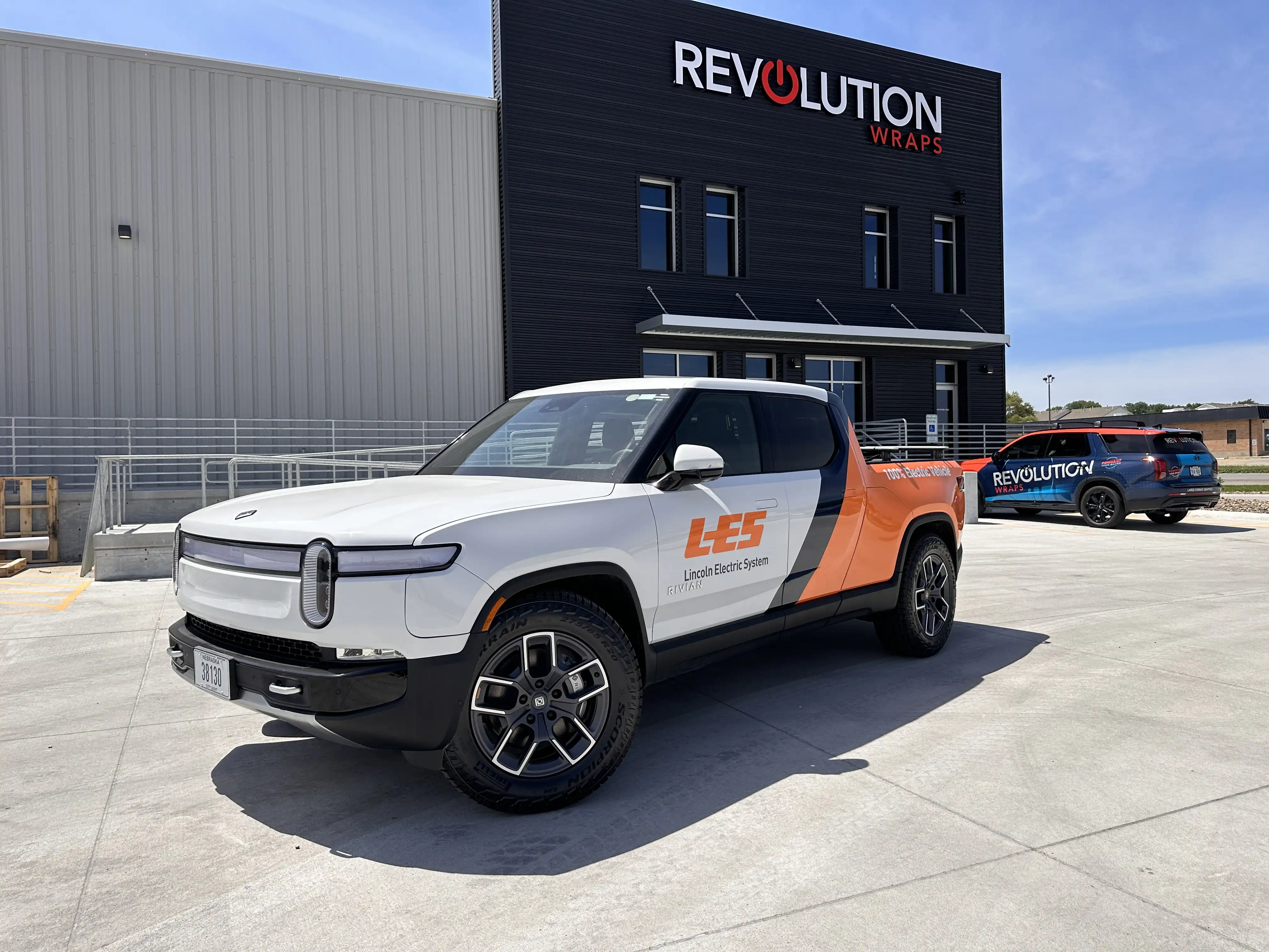 Professionally wrapped Rivian fleet vehicle by Revolution Wraps