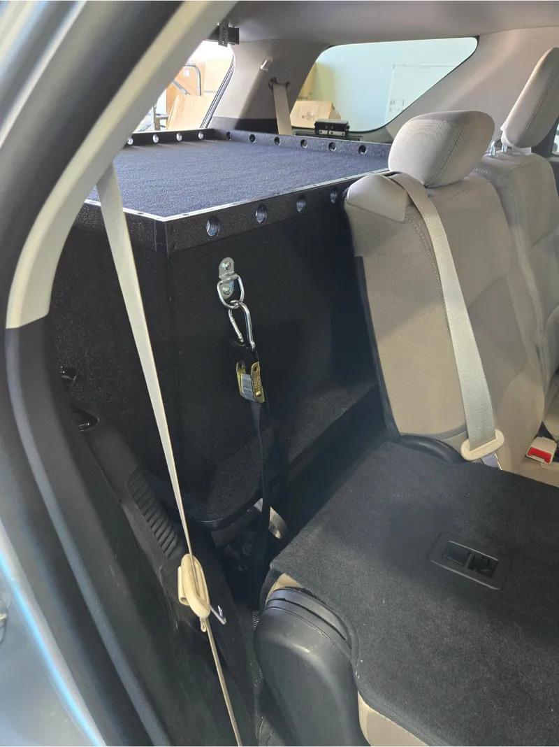 Magpul DAKA GRID organizer layout inside a custom TruckVault storage upfit