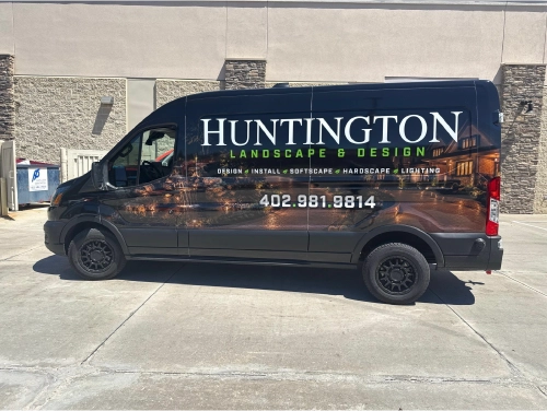 Full vehicle wrap on a Huntington Landscape & Design cargo van by Revolution Wraps